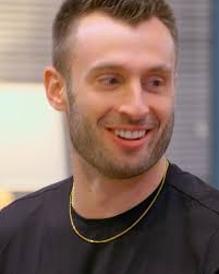 this is your sign to give the boy holding a fish a chance