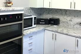 Decorative urns for memorial, funeral or burial. Modern White Gloss Real Kitchens