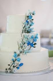 Classic White Wedding Cake With Blooming Branches Design Wedding Cake Flowers Blue Wedding Cakes Blue Royal Blue Wedding Cakes