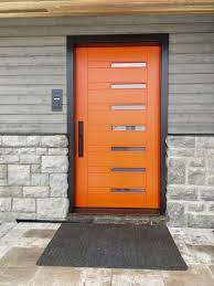 wow this amberwooddoor handmade custom mahogany orange door completely pops with this orange front doors midcentury modern front door single entry doors