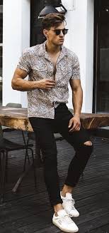 Summer Outfit Inspiration With A Printed Short Sleeve Shirt Black Framed Sunglasses Ripped Black Denim No Indie Fashion Men Spring Outfits Men Mens Streetwear