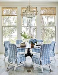 Find the perfect home furnishings at hayneedle, where you can buy online while you explore our room designs and curated looks for tips, ideas & inspiration to help you along the way. Blue Skirted Dining Chairs With Round Black Dining Table Cottage Dining Room