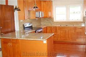 Our design staff has over 50 years of combined design and installation experience, so we. Verniz Tropical Granite Countertop And Cinnamon Maple Cabinets Verniz Tropical Yellow Granite Kitchen Design From United States Stonecontact Com