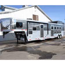 Photos may include options not included in the base price. 2018 Lakota Charger 4 Horse 15 Lq With Bunk Beds Slide Out
