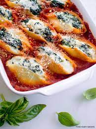 Stuff rolled lasagne sheets with creamy spinach and ricotta and bake with tomato and mascarpone sauces for a filling vegetarian meal. Spinach And Ricotta Stuffed Shells Fork Knife Swoon