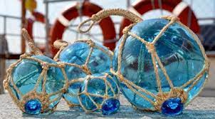 These floats were originally made to be netted and used as a japanese netted float to support drift nets. Glass Floats Fishermen S Glass Floats And Other Fishing Floats Decorative Glass Ball Floats Glass S Glass Floats Nautical Theme Decor Glass Fishing Floats