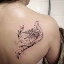 A religious tattoo on your shoulder indicates that your faith keeps you strong and is the. Phoenix Tattoo On The Shoulder Blade By Ivy Saruzi