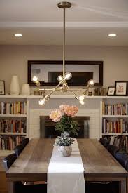 Ikea Morbylanga Table Bernhard Chairs Costplus Antique Gold Modular 8 Bulb Chandelier White Painted Bri Ikea Dining Table Ikea Dining Dining Room Lighting