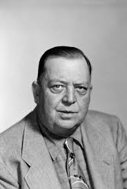 James Foster Jr. in a suit and tie, 2]