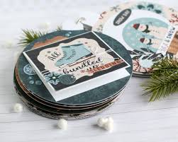 This is a guide about decorating a photo album. Let It Snow Shaped Mini Album Echo Park Paper