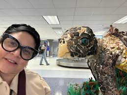 Home sweet home at last. Loved visiting my sons in Houston but there is no  place like home! What a beautiful airport we have. I love the art made from  trash found