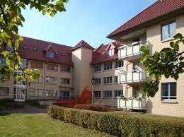 The apartment offers a children's playground. Senioren Wohnen Schweriner Wohnungsbaugenossenschaft Eg