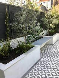 Paint It White White Rendered Walls And White Fencing Courtyard Gardens Design Back Garden Design Outdoor Gardens Design