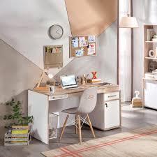 Cork boards, chalkboard paint, or white boards are all good ways to frame a desk—not to mention, they give space to hang schedules and important papers. Teen Desks Practical Boys Room Furniture That Encourages Study Time