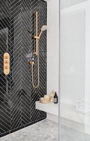Black And Gold Tiles Black Marble Herringbone Shower With Gold Fixtures Patterned Bathroom Tiles Gold Fixtures Bathroom Tile Designs