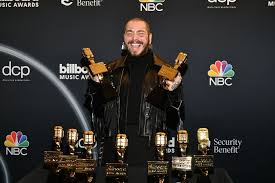 Austin richard post, known professionally as post malone, is an american rapper, singer, songwriter and record producer. Post Malone Wins Nine Billboard Music Awards Including Best Artist Bbc News