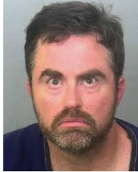 Fired New College official had history of indecent exposure charges