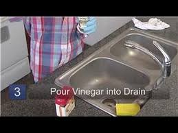 to clean a smelly drain