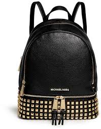 Michael kors abbey studded brown pvc signature medium backpack. Michael Michael Kors Michl Michl Kors Rhea Stud Small Leather Backpack 515 Lane Crawford Lookastic