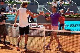 Germany's zverev, who was champion in madrid in 2018, made a strong start, breaking thiem early in each set in what turned out to be a routine victory, despite a swirling wind at caja magica. N Osrhh67yzhqm