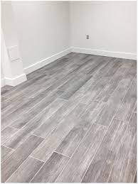 Pin By Doriane On Cocina In 2020 Gray Wood Tile Flooring Grey Wood Tile House Flooring