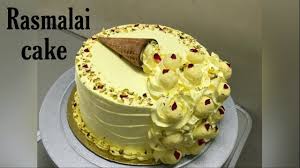 Rasmalai is a chilled dessert that consists of soft and fluffy paneer dumplings soaked in a thick milk syrup, flavored with cardamom and saffron. Rasmalai Cake Decoration Cake Decoration Idea New Design Youtube