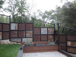Call us today for an estimate! Corrugated Metal Fence Ideas Fence Made Using Old Corrugated Metal Roofing Corrugated Metal Fence Corrugated Metal Roof Backyard Fences
