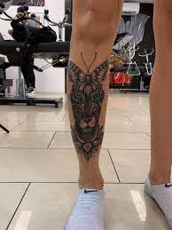 lowe tattoo schmetterling tattoo realistisch tattoo bein tattoo black and grey tattoo realostic tattoo mandala tattoo lin body art tattoo studio tattoos