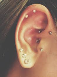 my newest daith piercing alongside forward helix double cartiledge tragus and triple line piercings piercing ohrringe piercing piercings ohr