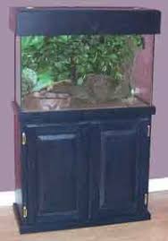Best diy aquarium stand plans from how to build an aquarium cabinet stand the start of a man. 28 Aquarium Stand Plans Fish Tank Stand Plans Ideas Aquarium Stand Fish Tank Stand Tank Stand