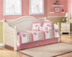 The Cottage Retreat Daybed By Signature Design By Ashley Takes Early American Country Design To Create Daybed Bedding Sets Wood Daybed Ashley Furniture Bedroom