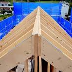This image shows a close-up view of the roof framing of a ...