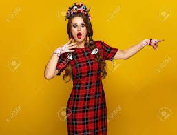 Take action now for maximum saving as these discount. Colorful Halloween Surprised Young Woman In Mexican Style Halloween Costume Isolated On Yellow Pointing At Something Stock Photo Picture And Royalty Free Image Image 88502686