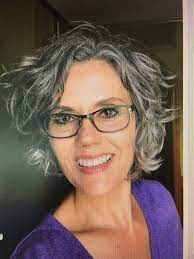 Pin By Ursula On Haircuts Chin Length Hair Grey Hair And Glasses Grey Curly Hair