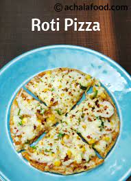 Roti Pizza Recipe How To Make Pizza From Leftover Chapati Pizza Roti Recipe Pizza Recipes North Indian Vegetarian Recipes Veg Recipes