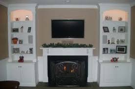 Maybe you would like to learn more about one of these? Close In Shelves Bottom Arch Top Lights Top Living Room Remodel Brick Living Room Room Remodeling