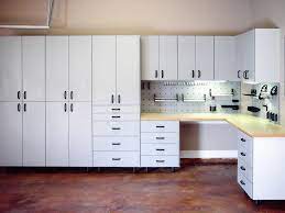 Today i show you how to build your own garage shelving unit built out of 2x4s and plywood (or osb). Custom Built Garages New Orleans Custom Garage Cabinets
