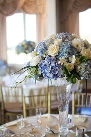Blue Hydrangea And White Rose Centerpiece Blue Hydrangea Centerpieces Simple Wedding Flowers Inexpensive Wedding Flowers