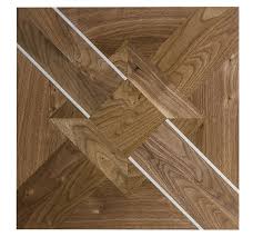 modern twist on a classic parquet pattern oshkosh designs manor rae parquet in character american wa wood parquet flooring parquet flooring wood panel walls