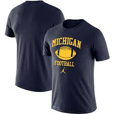 Jordan brand michigan wolverines heathered gray logo basketball spotlight performance pullover hoodie. Michigan Wolverines Jordan Brand Retro Football Lockup Legend Performance T Shirt Navy