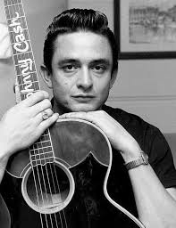 On this day in 1971, 'Man In Black' was released. What's your favorite  Johnny Cash song? Pictured here is an original ad promoting the release of  the album