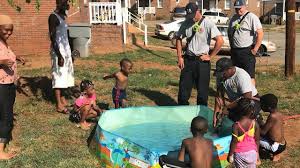 Firefighters help family trying to fill pool using pots of water for little  boy's birthday