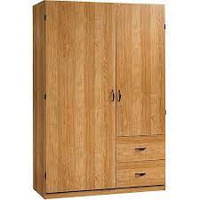 If you lack closet space, our wardrobe armoires are indispensable. Sauder Beginnings Wardrobe Storage Cabinet Highland Oak Walmart Com Walmart Com