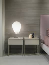 A small bedside table is perfect if you simply need somewhere to place your phone. Bedside Table With Smoked Glass Shelf Idfdesign