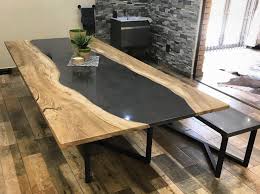 Polished Concrete And Wild Olive Wood Fused To Create A Unique Dining Table Concrete Wood St Contemporary Furniture Unique Dining Tables Concrete Furniture