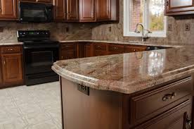 This newly remodeled kitchen boasts a tiled backsplash and granite countertops. Granite Fabricators Nj Quartz Countertops Nj Granite Countertops Nj