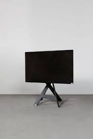 Tv Stand Stander Only Four Legs And Yet Extraordinary Your Tv Becomes An Objet D Art In Your Living Room The Cables Tv Stand With Mount Tv Holder Tv Stand
