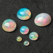 The entire stone is cut from a single piece of rough (see top illustration). Aa Ethiopian Opal Cabochons