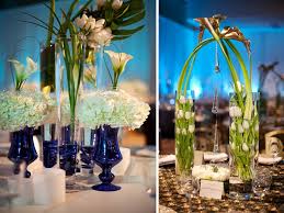 Pair with true purple to enhance the richness of the f Chic White And Blue Wedding Reception Centerpieces Using White Hydrangeas Lilies And Roses