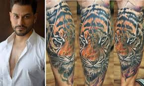 10 television celebrities who expressed love for their partners through tattoos karan mehra and nisha rawal's wedding after five years of togetherness, karan and nisha had finally understood that they were made for each other and wish to grow old together. Kunal Kemmu Gets A Tattoo Of Tiger On His Leg